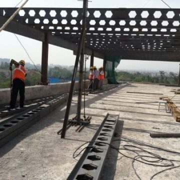 Castellated beam fabrication and erection